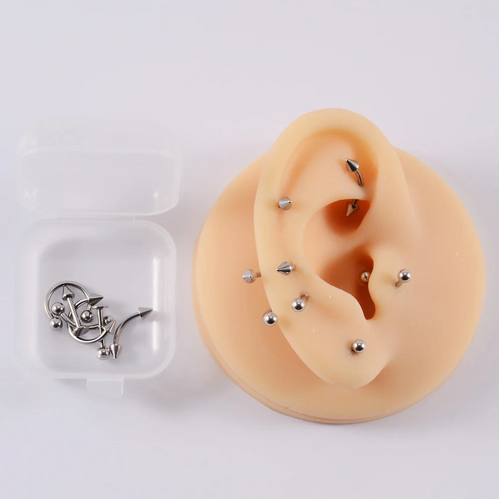 A set of 12 pieces of surgical steel, suitable for ear, nose, eyebrow and lip piercings.