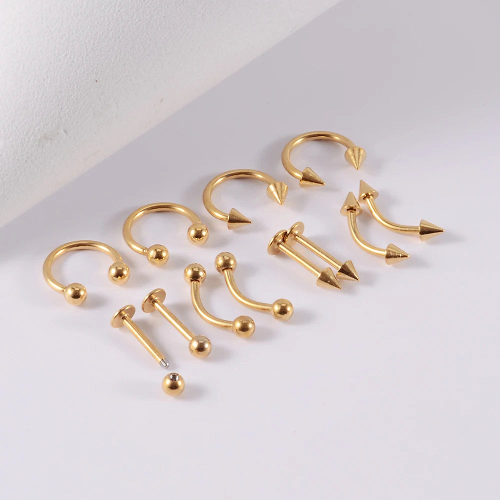 A set of 12 pieces of surgical steel, suitable for ear, nose, eyebrow and lip piercings.